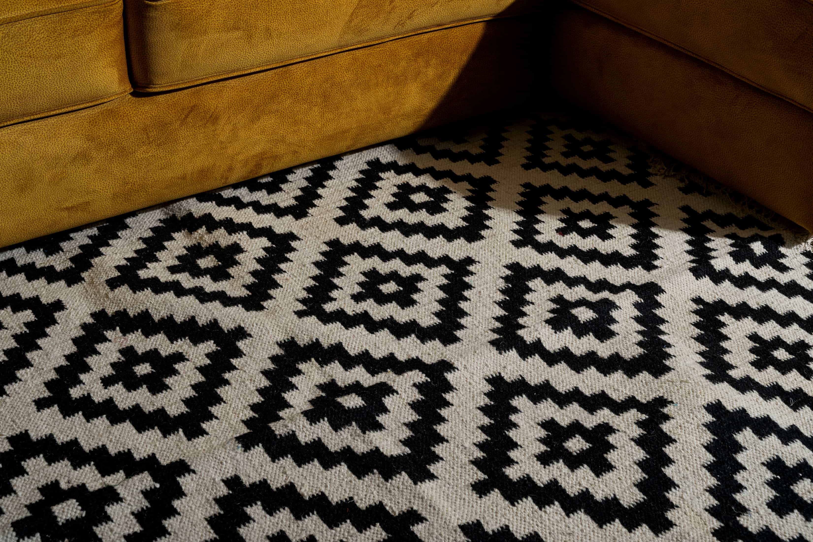 Handwoven Cotton Wool Rug – Black and Ivory Diamond Geometric Pattern
