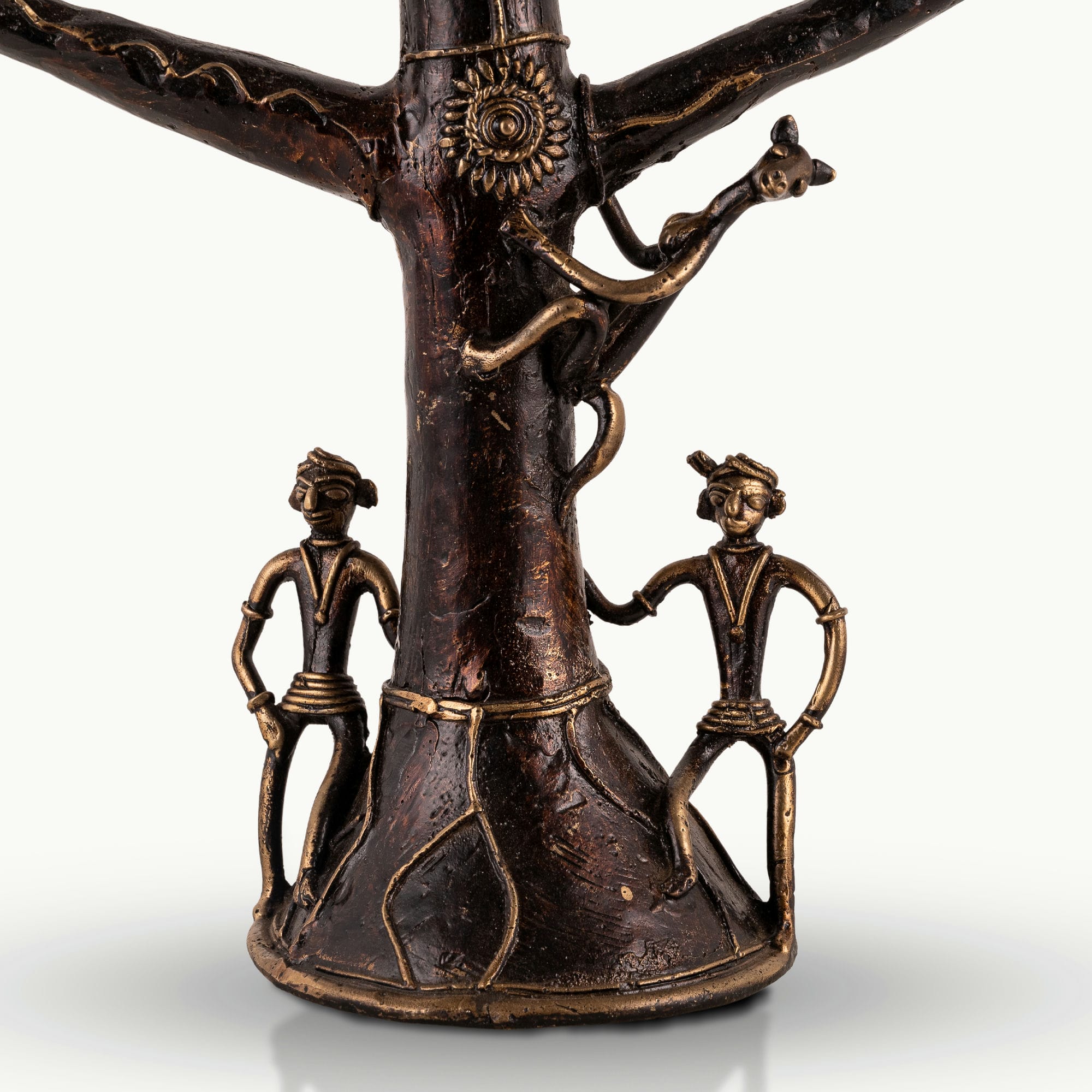 Dhokra Brass Tree Sculpture extending its ancestral branches on an entryway credenza