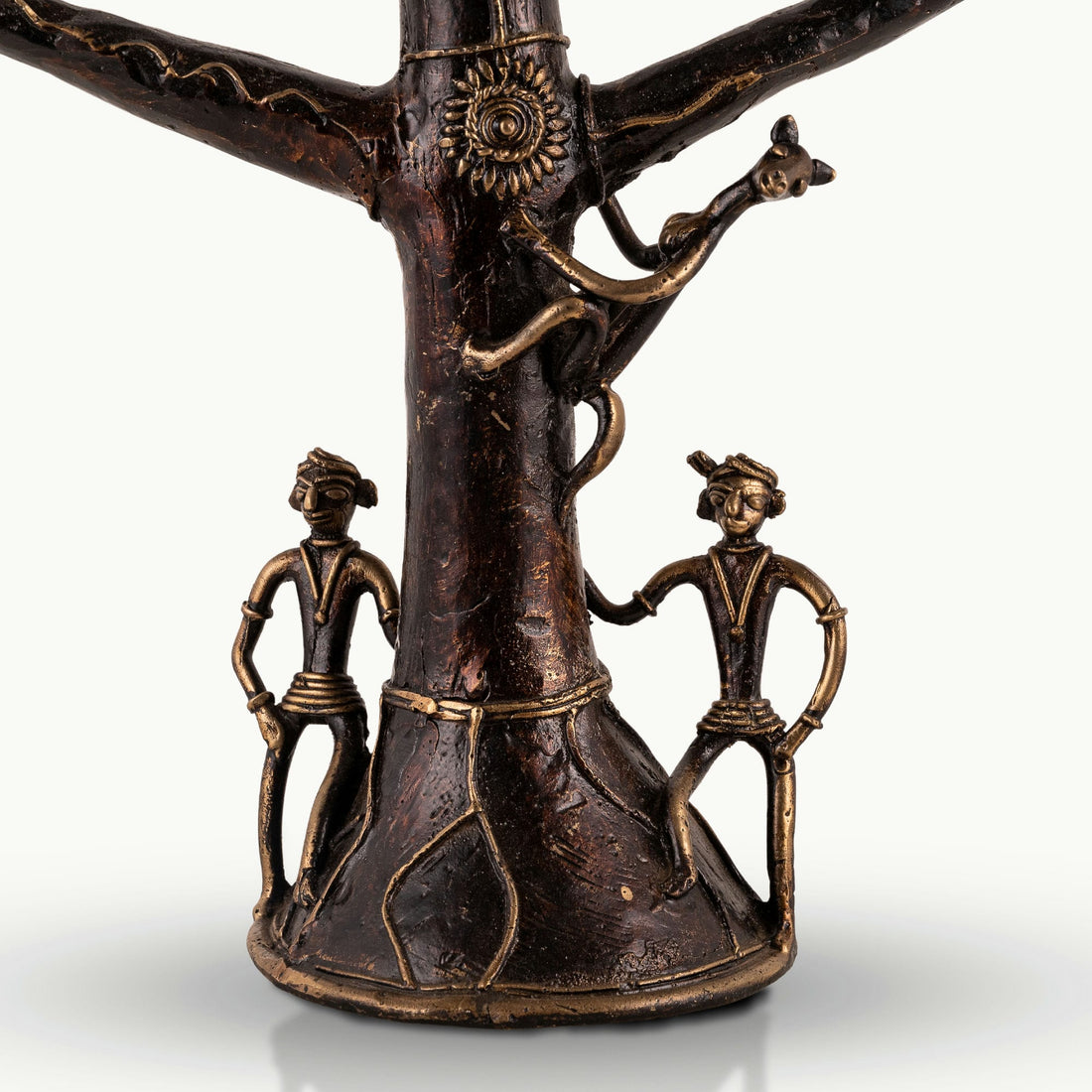 Dhokra Brass Tree Sculpture extending its ancestral branches on an entryway credenza