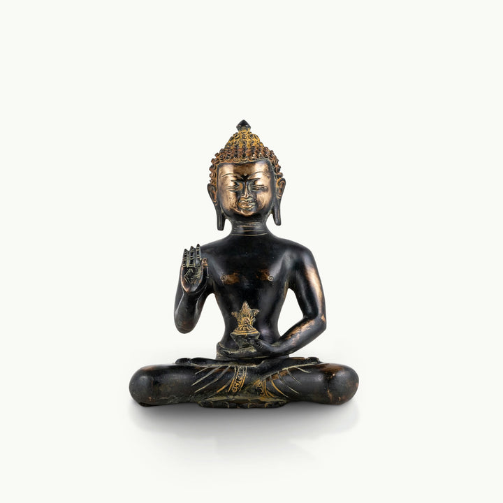 Brass buddha in sitting position