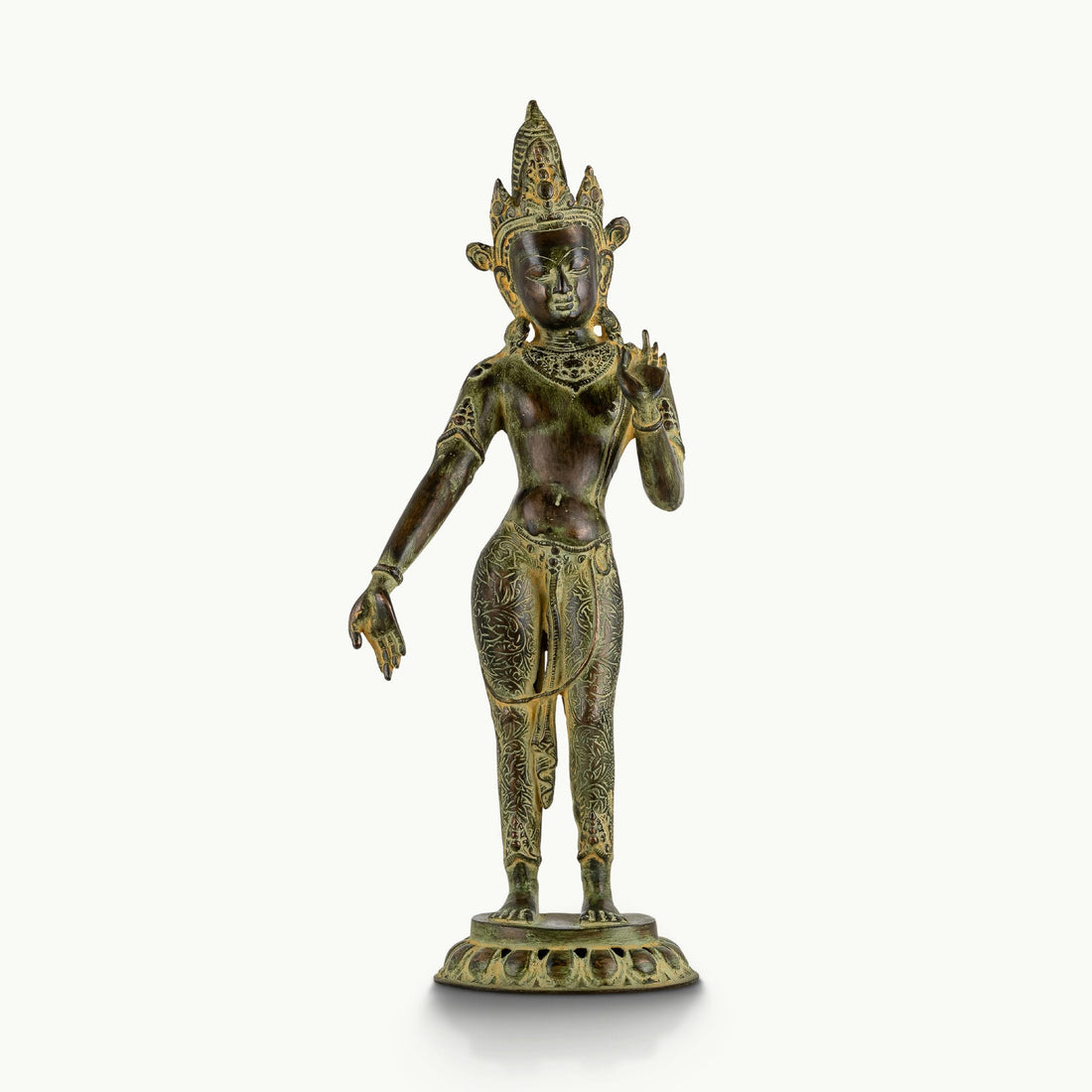 Engraved brass standing Devi statue in a graceful three-bend posture with a chased botanical dhoti.