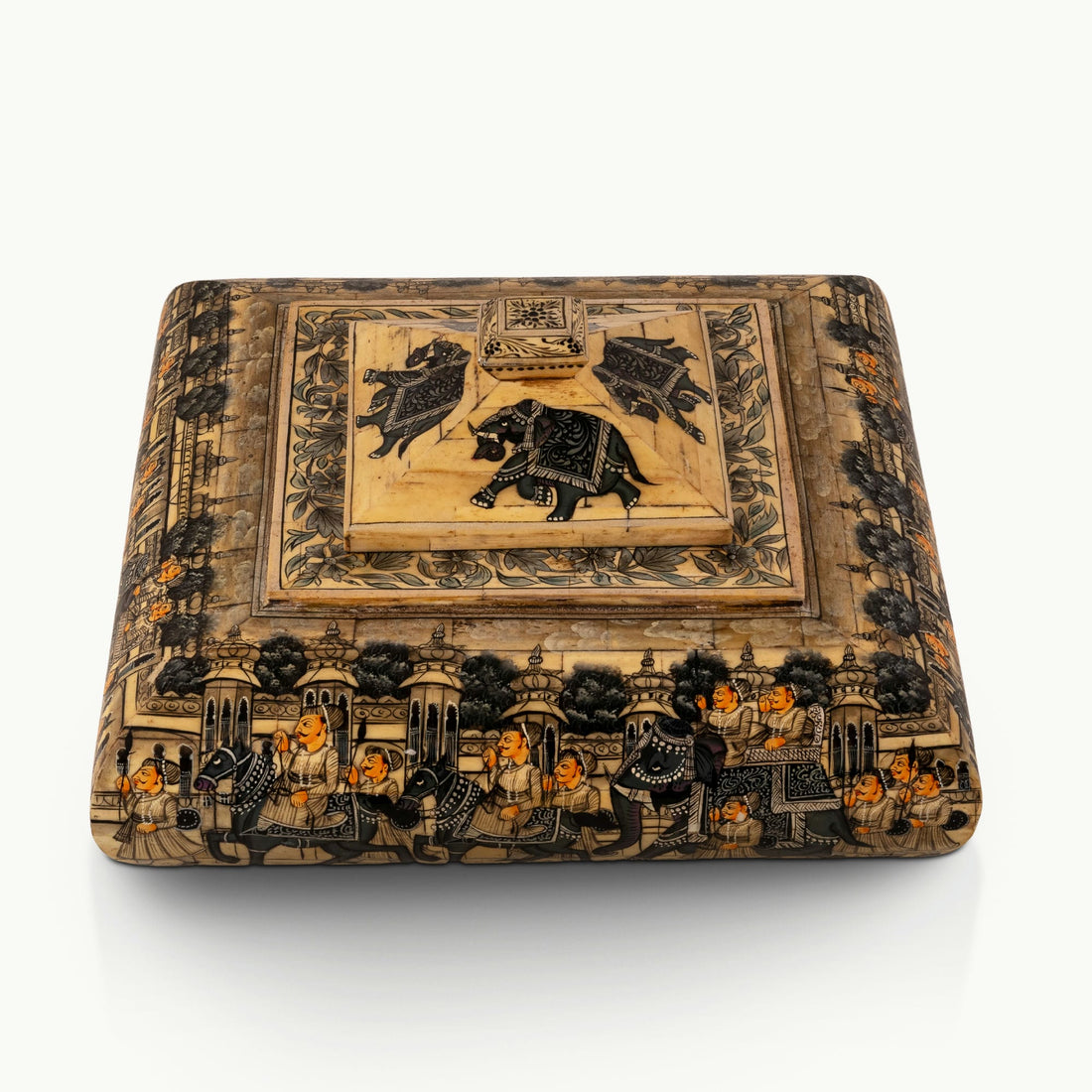 Square painted camel bone box depicting a Rajput royal procession on a dark vanity.