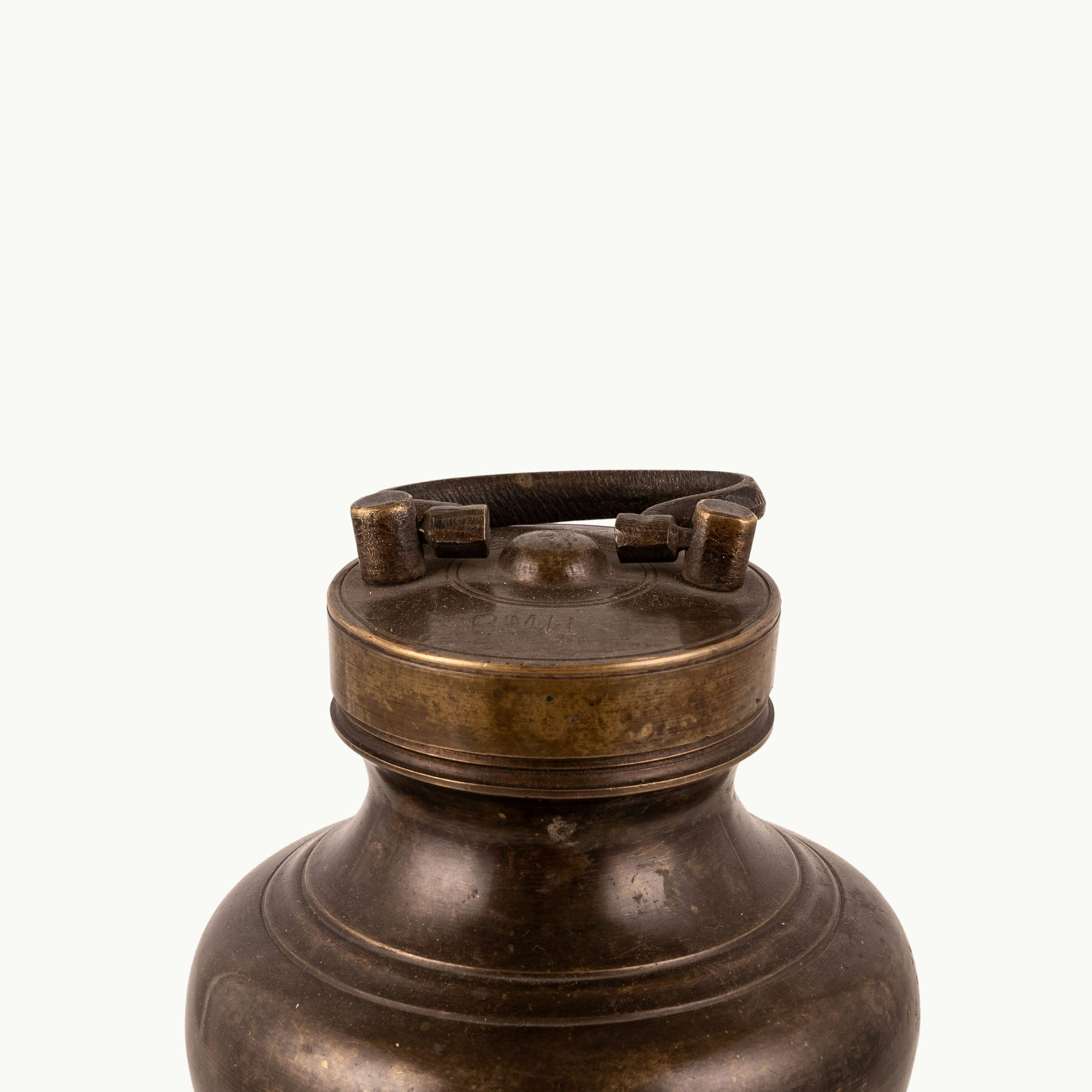 Antique Brass Surma Container with a tiny finger loop for a mirrored dressing tray.