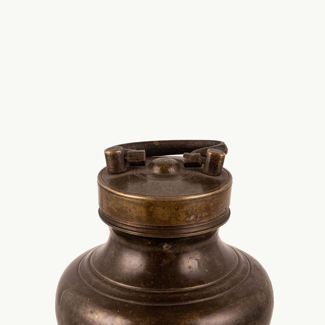 Antique Brass Surma Container with a tiny finger loop for a mirrored dressing tray.