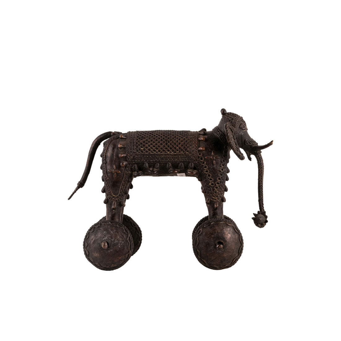 Dhokra Brass Wheeled Elephant ready for a ceremonial procession on a reclaimed wood coffee table. 