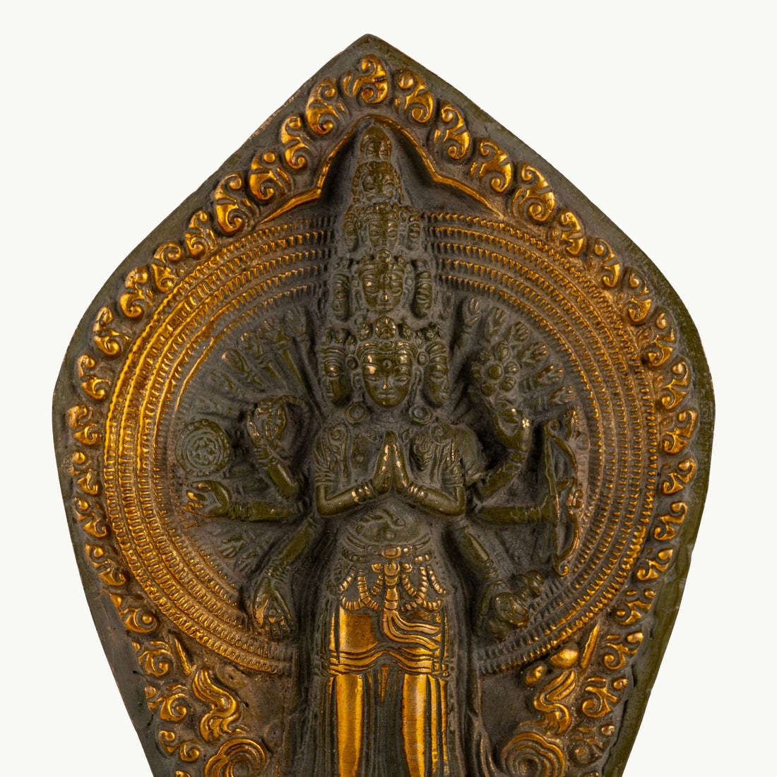 11-Headed Brass Avalokiteshvara Statue standing upright on a west-facing meditation altar. 