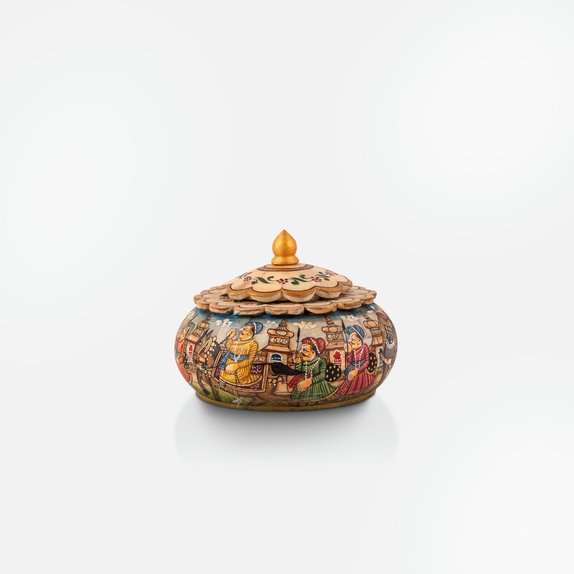 Hand-painted camel bone box illustrating a detailed Maharaja's march with layered palace architecture.