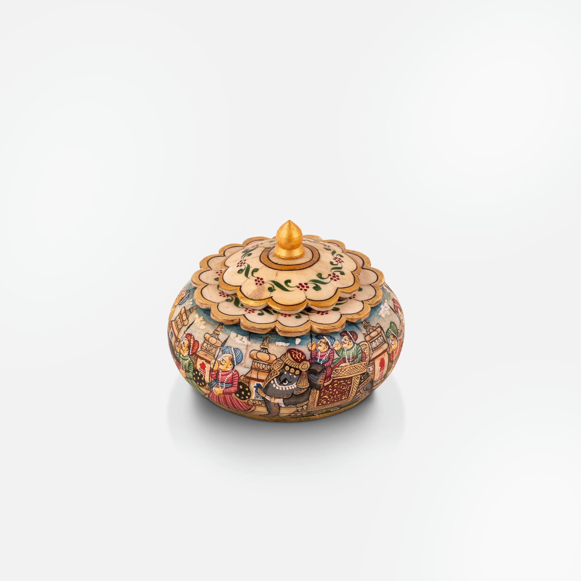 Hand-painted camel bone box illustrating a detailed Maharaja's march with layered palace architecture.