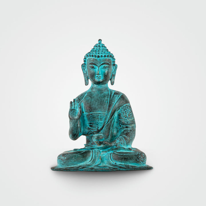 Verdigris Brass Abhaya Buddha Statue radiating fearlessness for a living room mantle. 