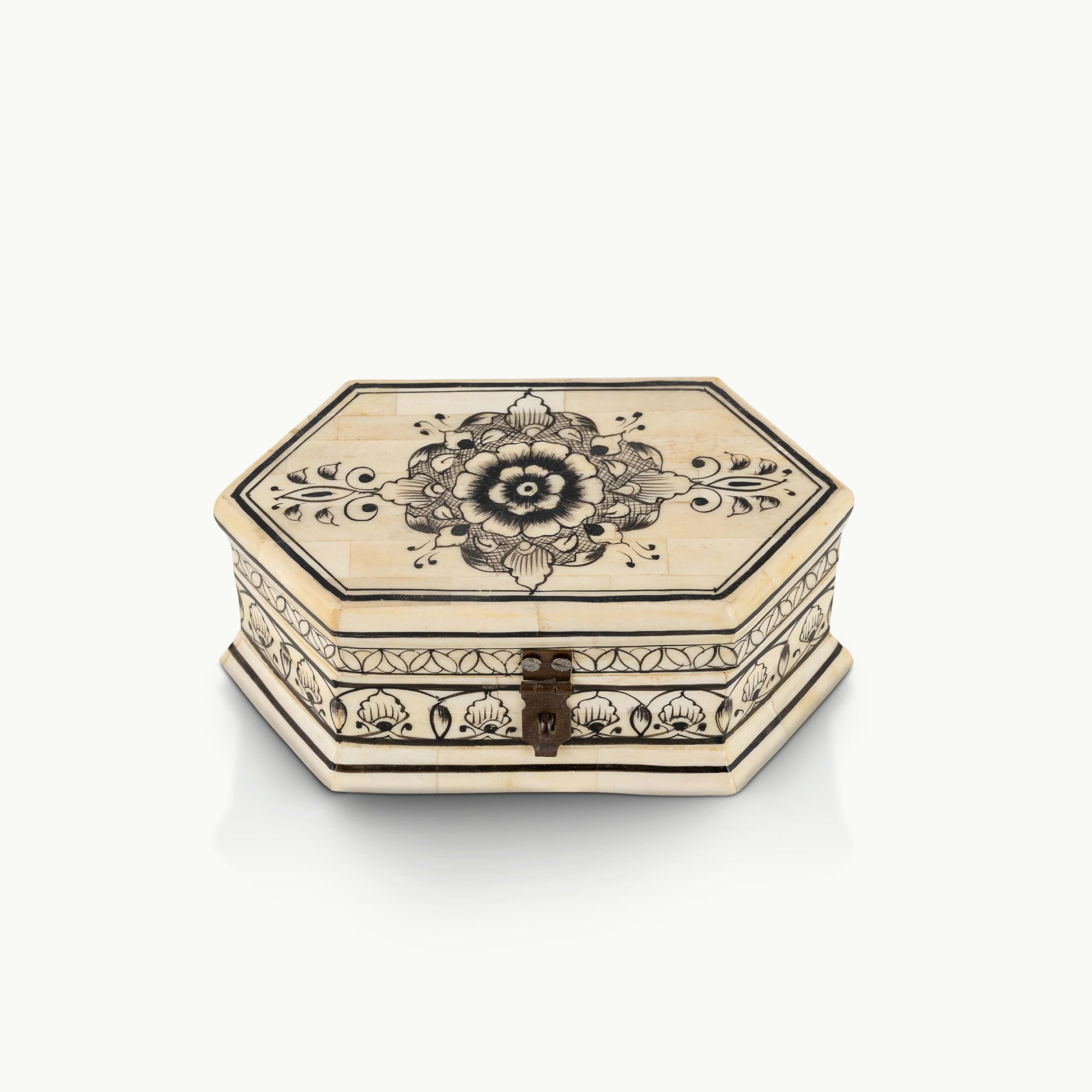 Octagonal painted camel bone box featuring black ink mandala motifs.