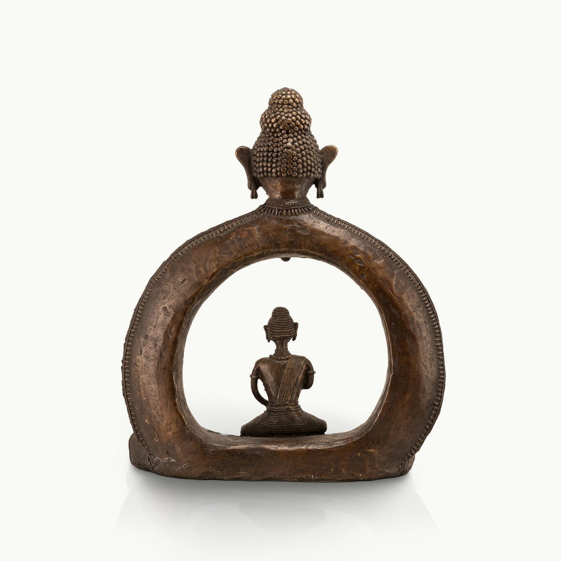 Cosmic enlightened figure decor seating a smaller meditating monk within an arch for a dedicated meditation room or zen garden.