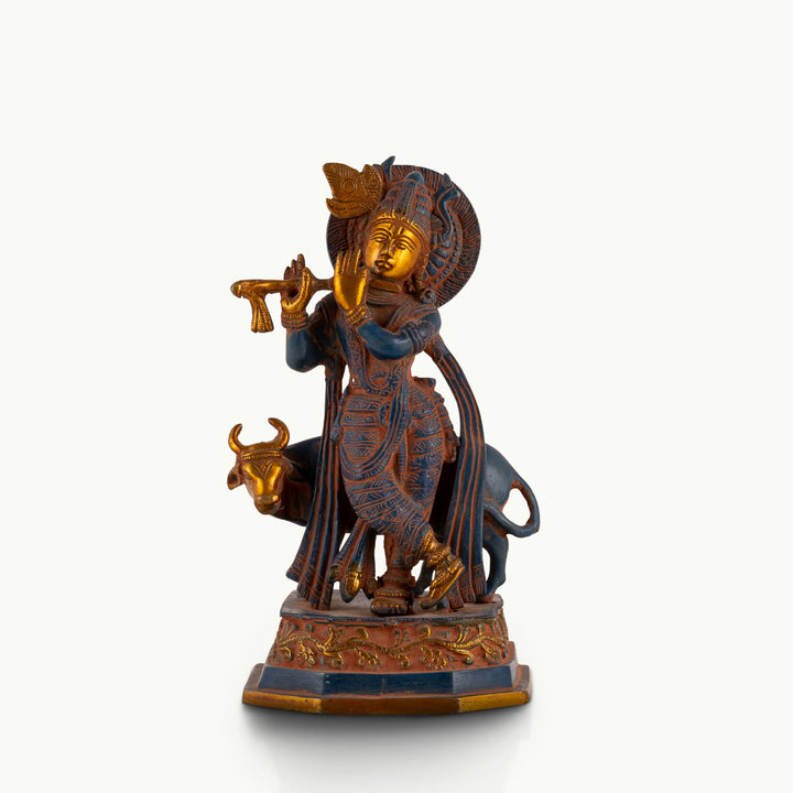Black Brass Tribal Head Sculpture projecting an ancestral presence on a floating gallery shelf. 