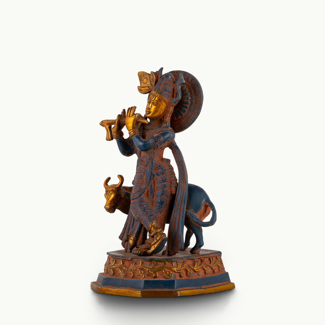 Black Brass Tribal Head Sculpture projecting an ancestral presence on a floating gallery shelf. 