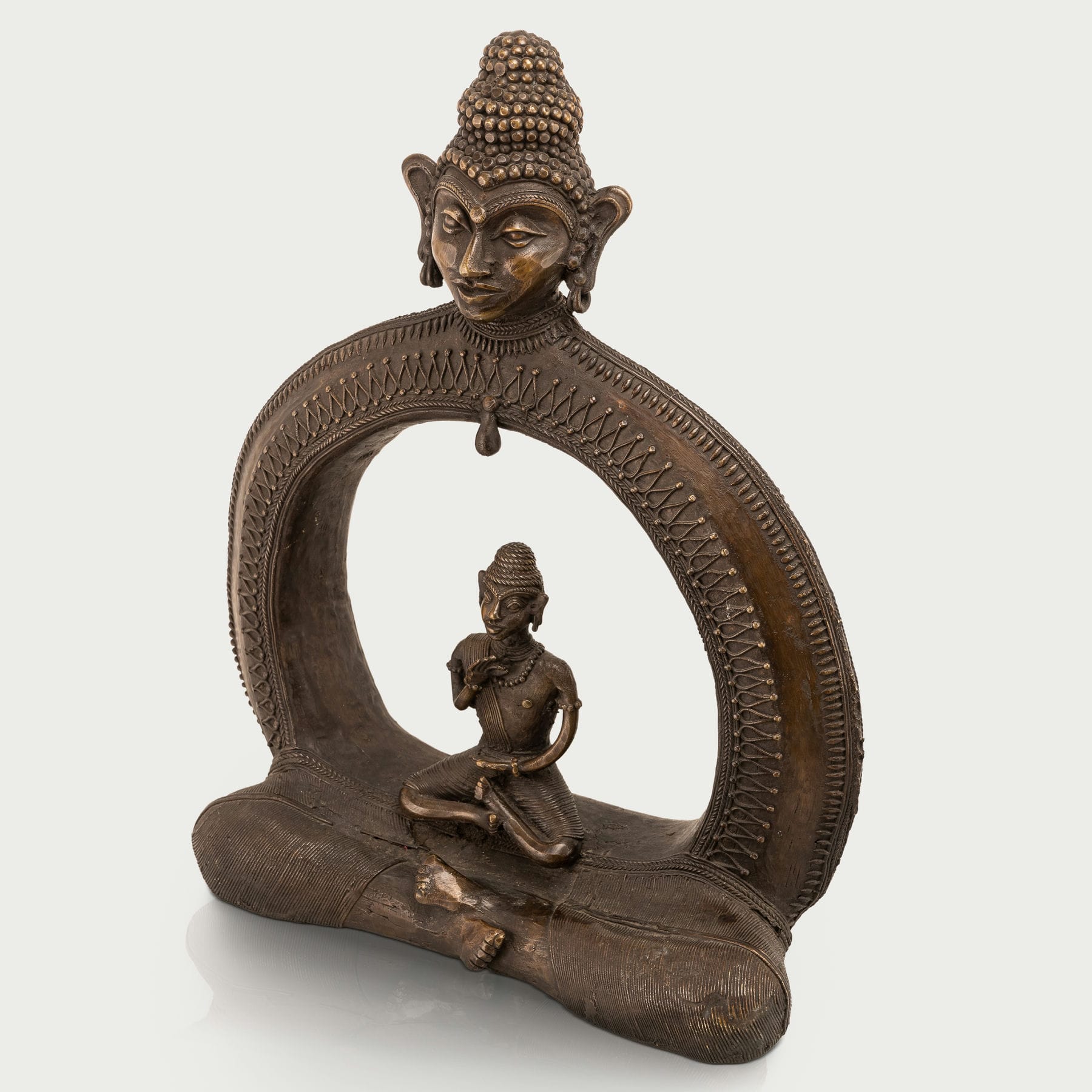 Cosmic enlightened figure decor seating a smaller meditating monk within an arch for a dedicated meditation room or zen garden.