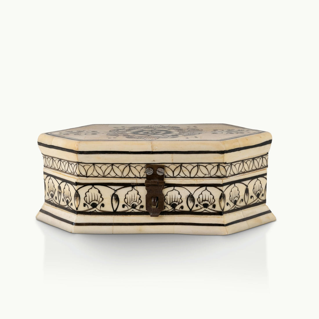 Octagonal painted camel bone box featuring black ink mandala motifs.