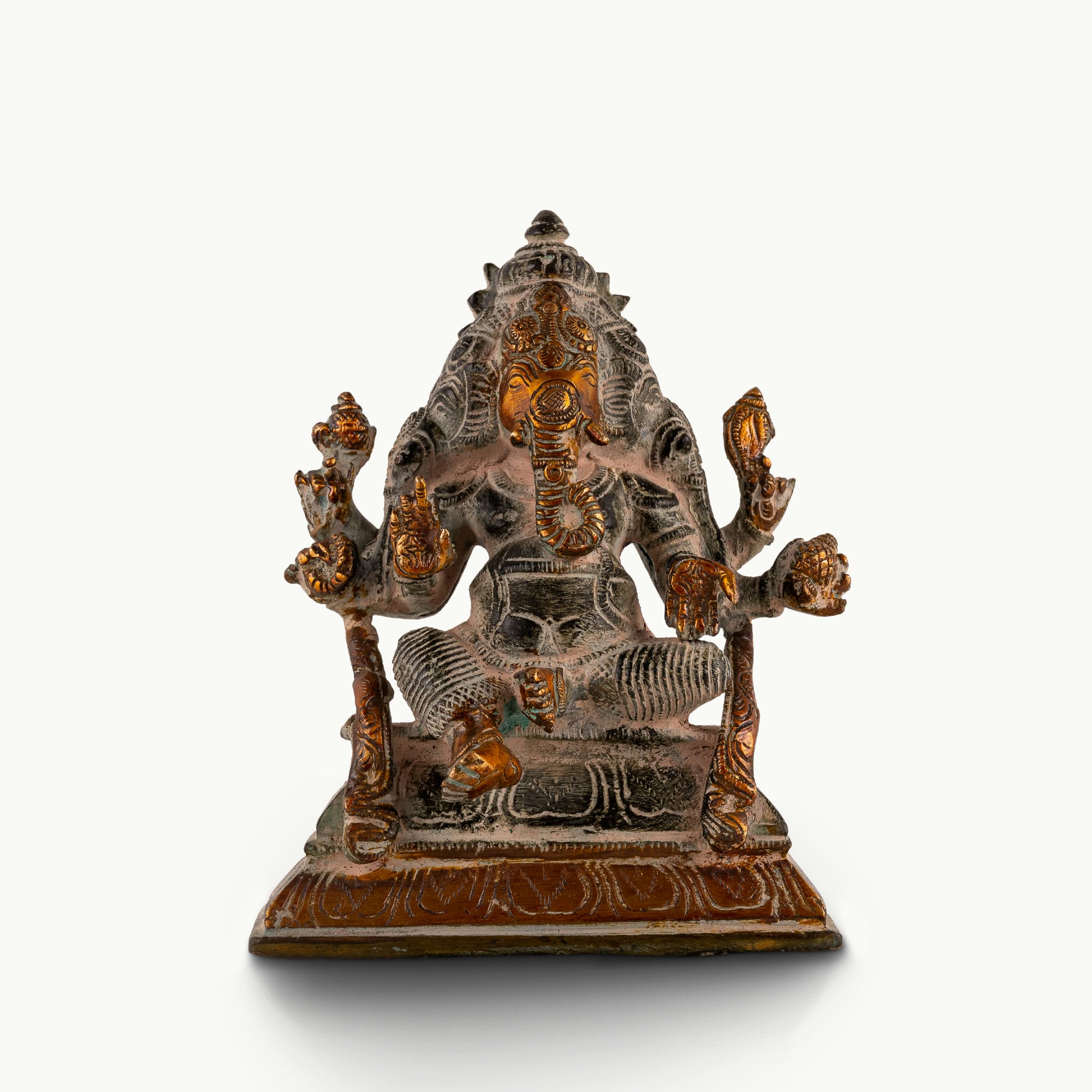 Dual-Tone Brass Ganesha Statue seated in Lalitasana for an east-facing puja altar. 