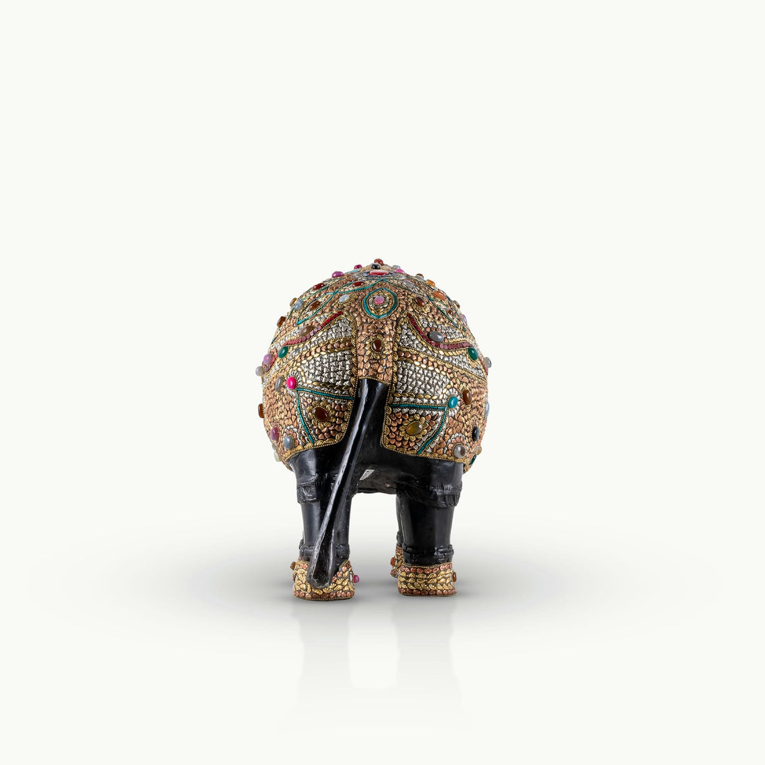 Stone inlay brass elephant sculpture featuring turquoise and lapis accents.