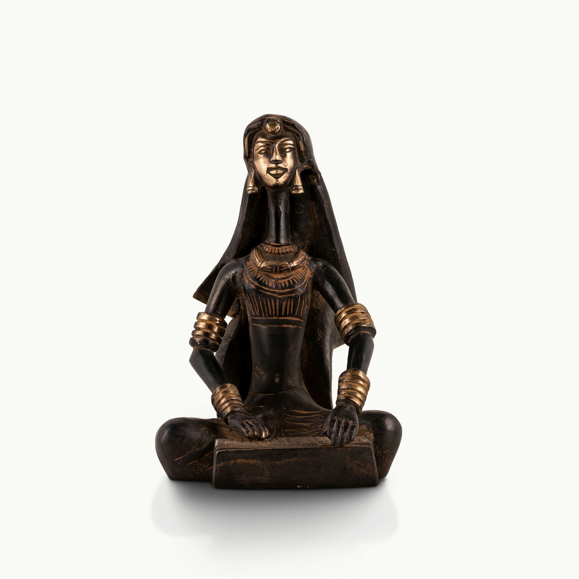 Tribal Brass Musician Sculpture playing a traditional box instrument for a minimalist console. 