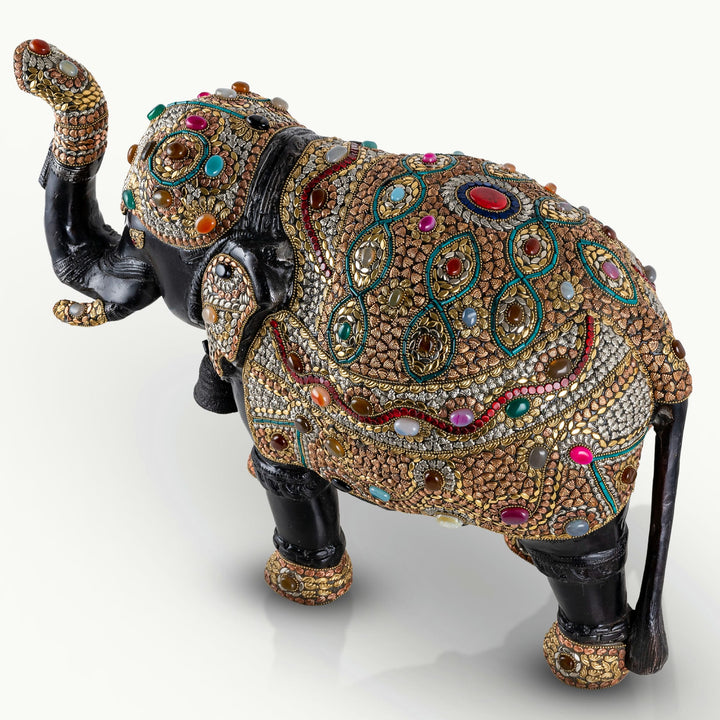 Big brass elephant with stone work