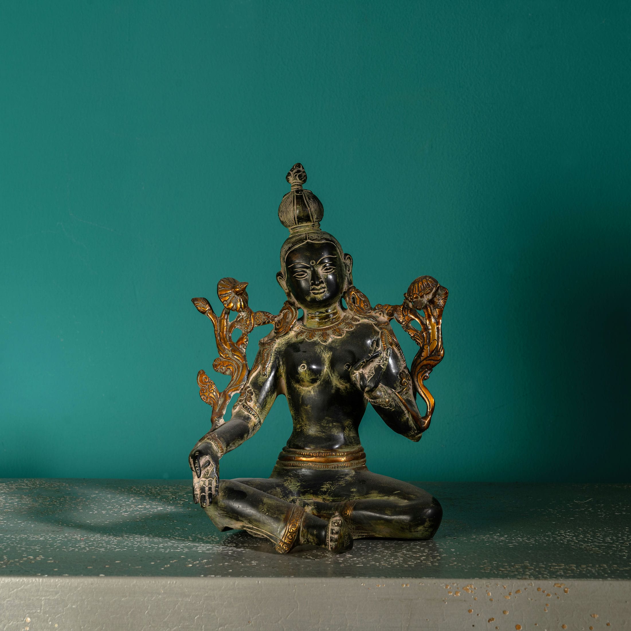 Black Brass Seated Tara Statue: The Obsidian Bloom