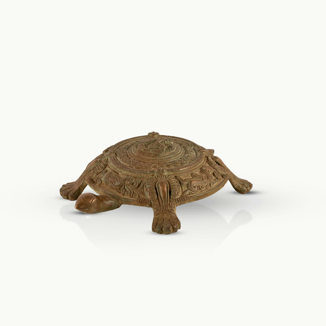 Brass Ganesha Tortoise Idol featuring chased mandalas for a home altar or entrance