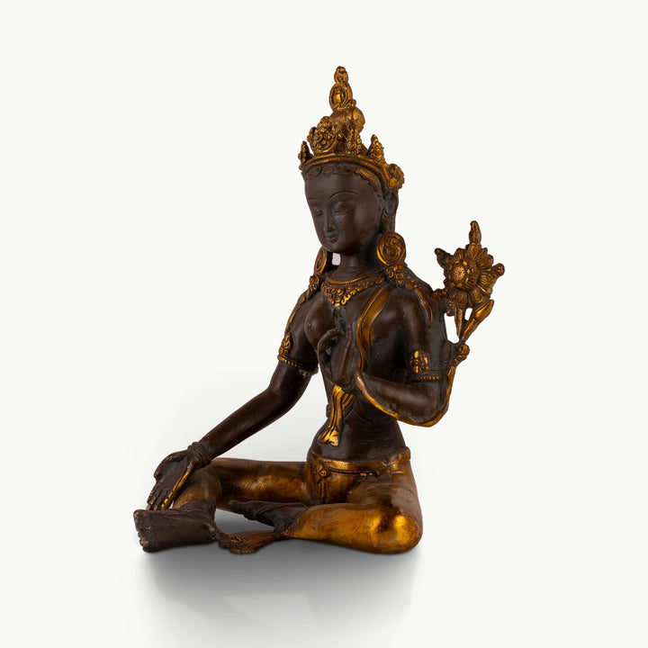 Antique gilded bronze seated bodhisattva with lotus blossom