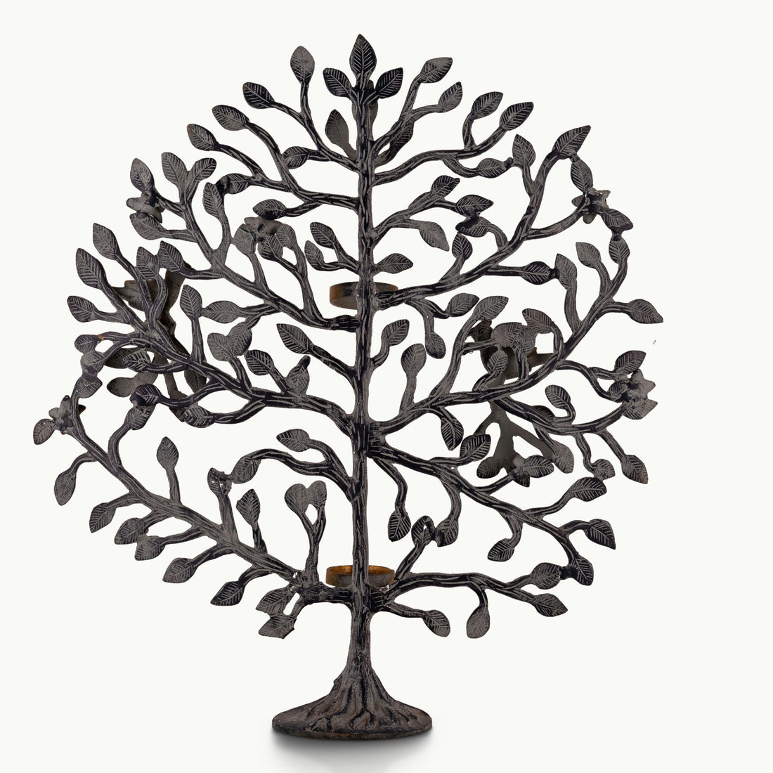 Dual-tone brass tree tealight holder with dark oxidized branches and golden birds.