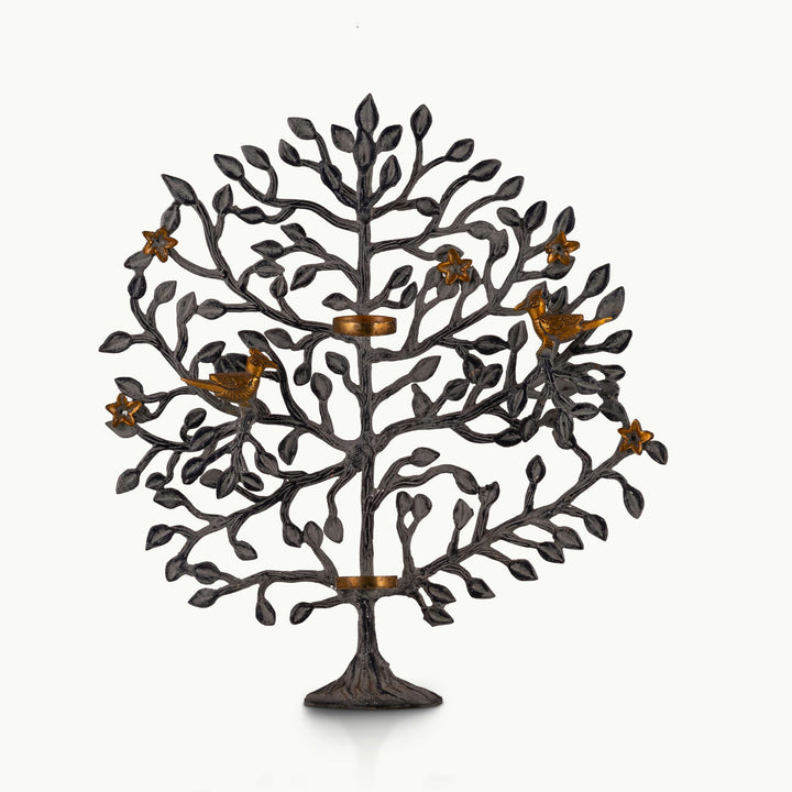 Dual-tone brass tree tealight holder with dark oxidized branches and golden birds.