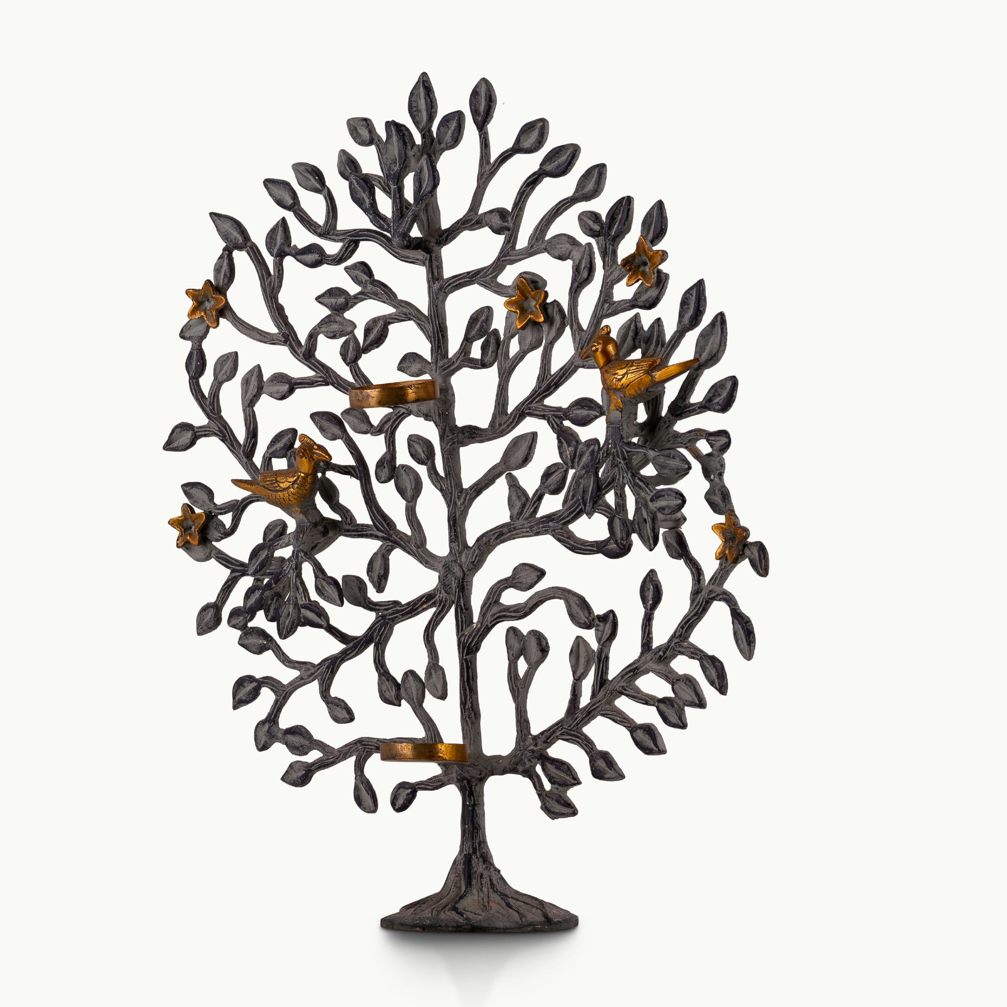 Dual-tone brass tree tealight holder with dark oxidized branches and golden birds.