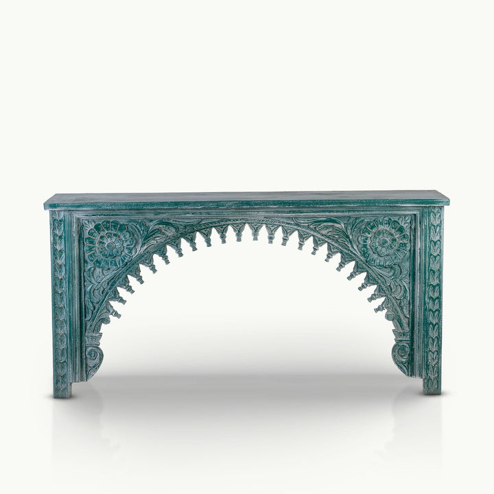 Green carved mango wood console featuring a distressed floral archway.