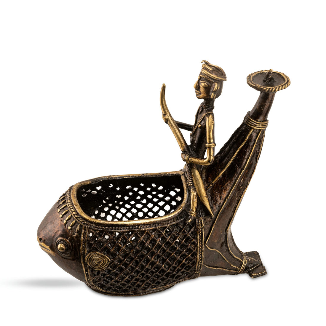 Dhokra Brass Boat Planter holding a small oil lamp on a living room windowsill. 