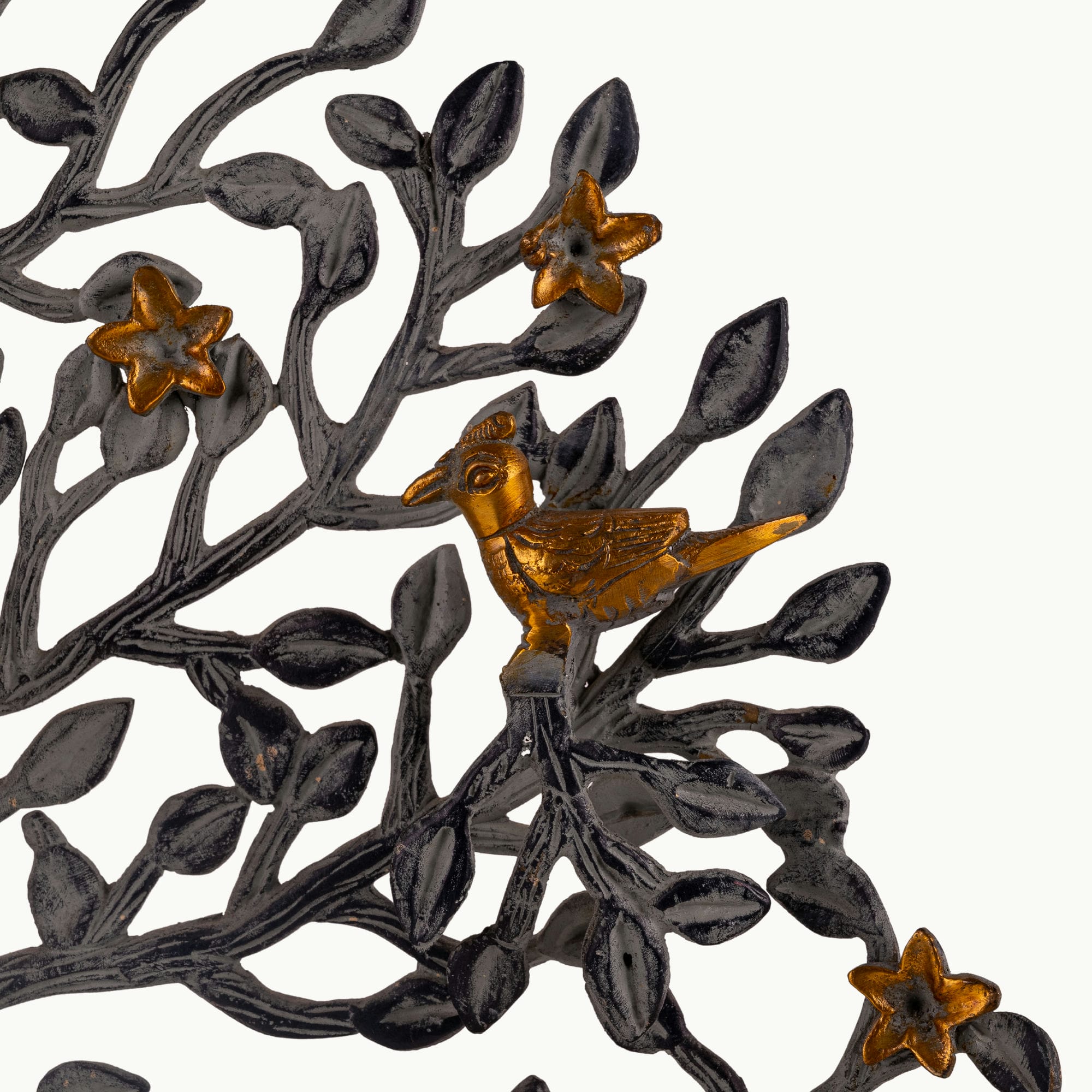 Dual-tone brass tree tealight holder with dark oxidized branches and golden birds.