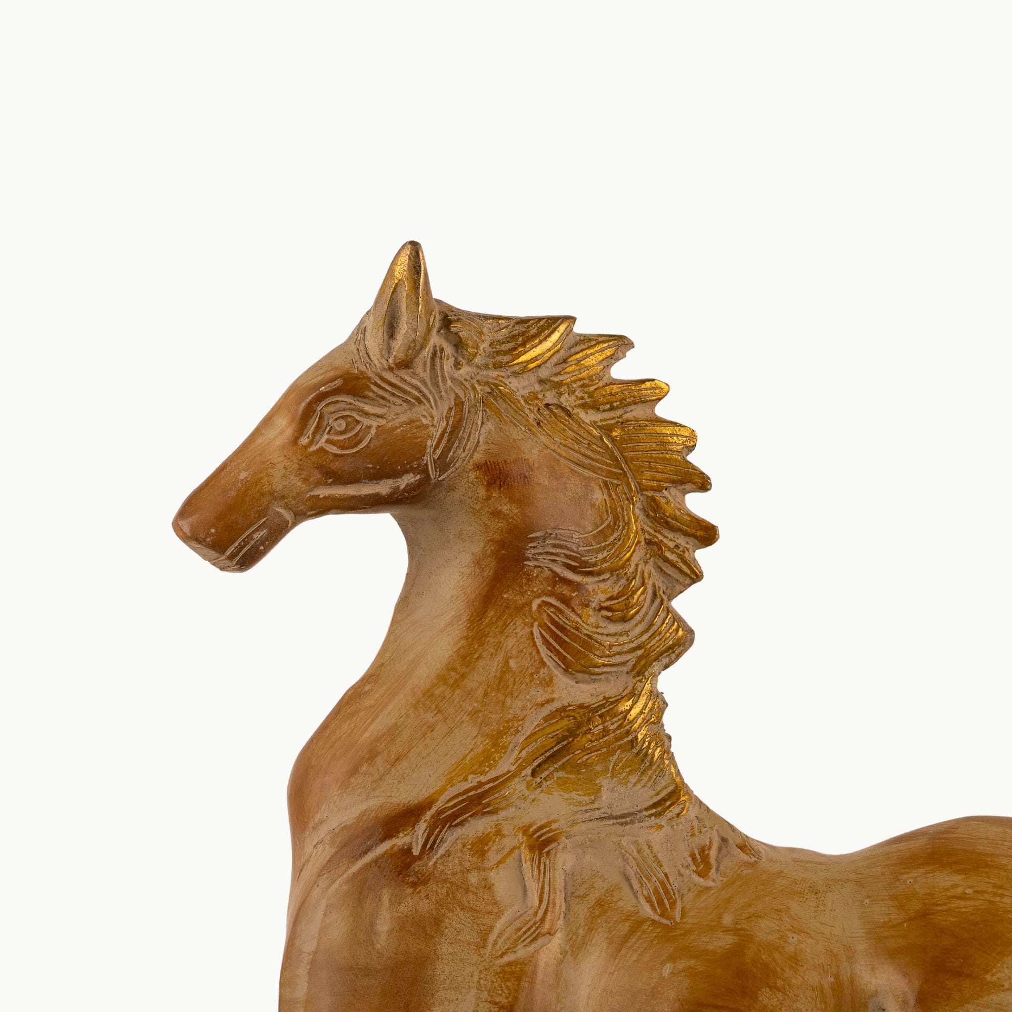 Antique resin-cast stylized horse figurine with gilded mane and tail