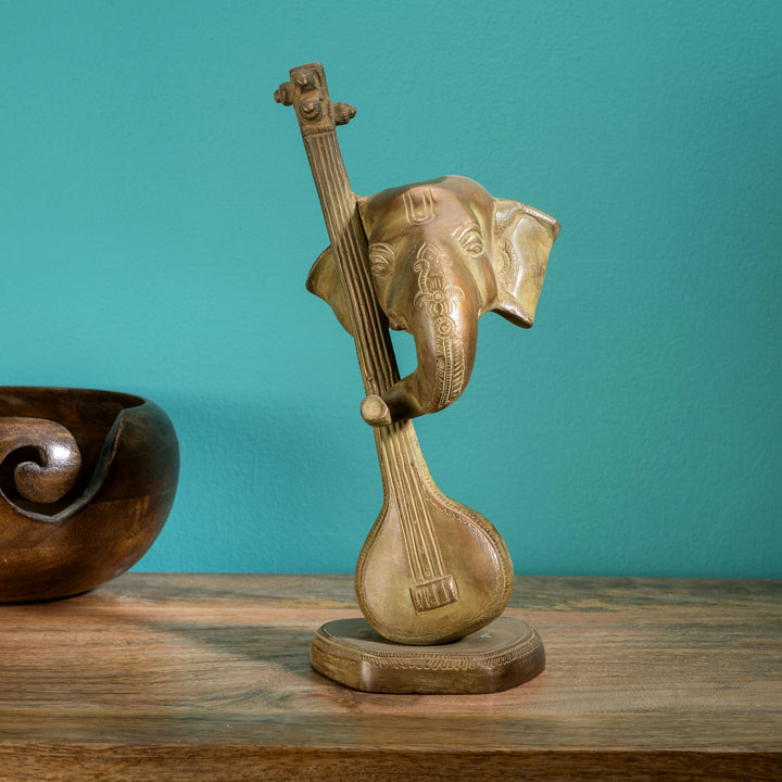 Antique Brass Musical Elephant Sculpture: The Resonant Sovereign