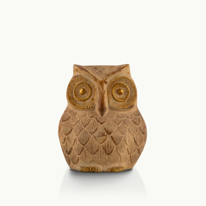 Pale brass owl sculpture with a whitewashed geometric finish.