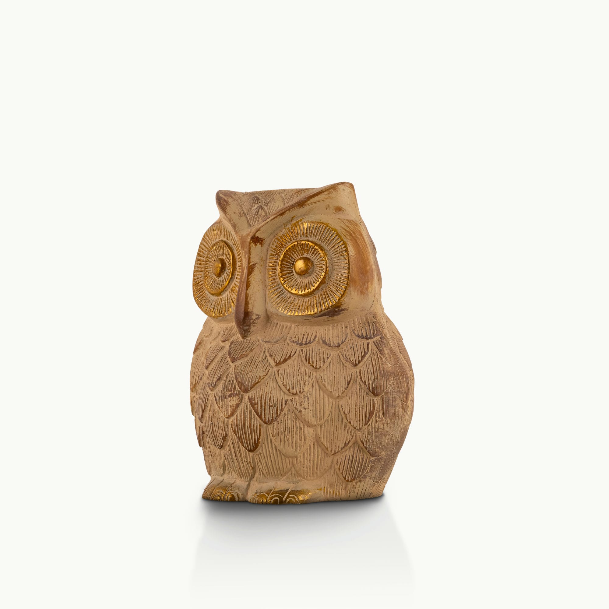 Whitewashed textured owl figurine with gilded eyes and accents