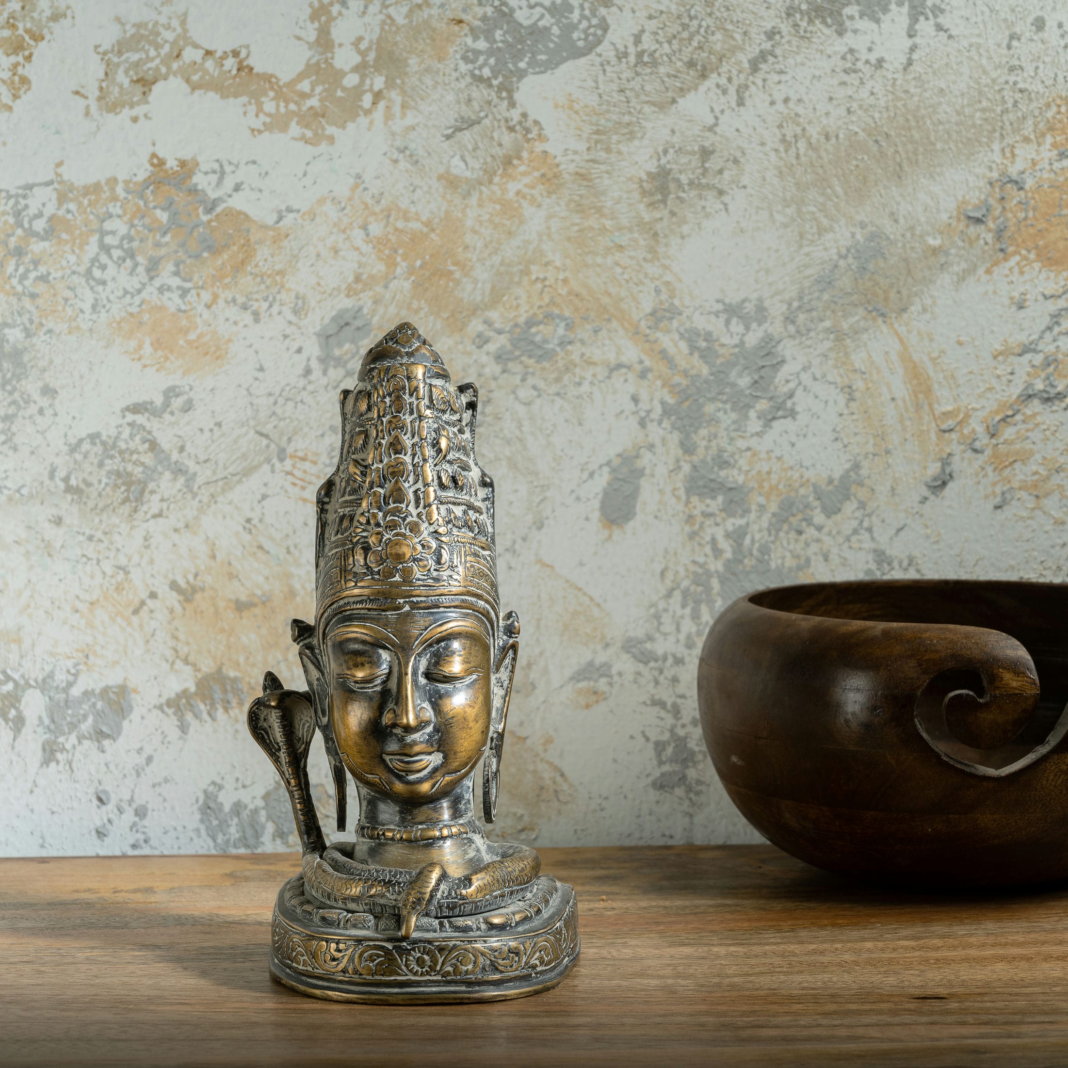 Distressed Brass Shiva Bust depicting the supreme ascetic on a meditation altar