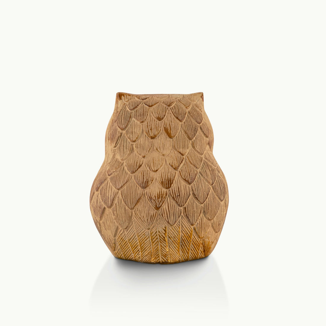 Whitewashed textured owl figurine with gilded eyes and accents