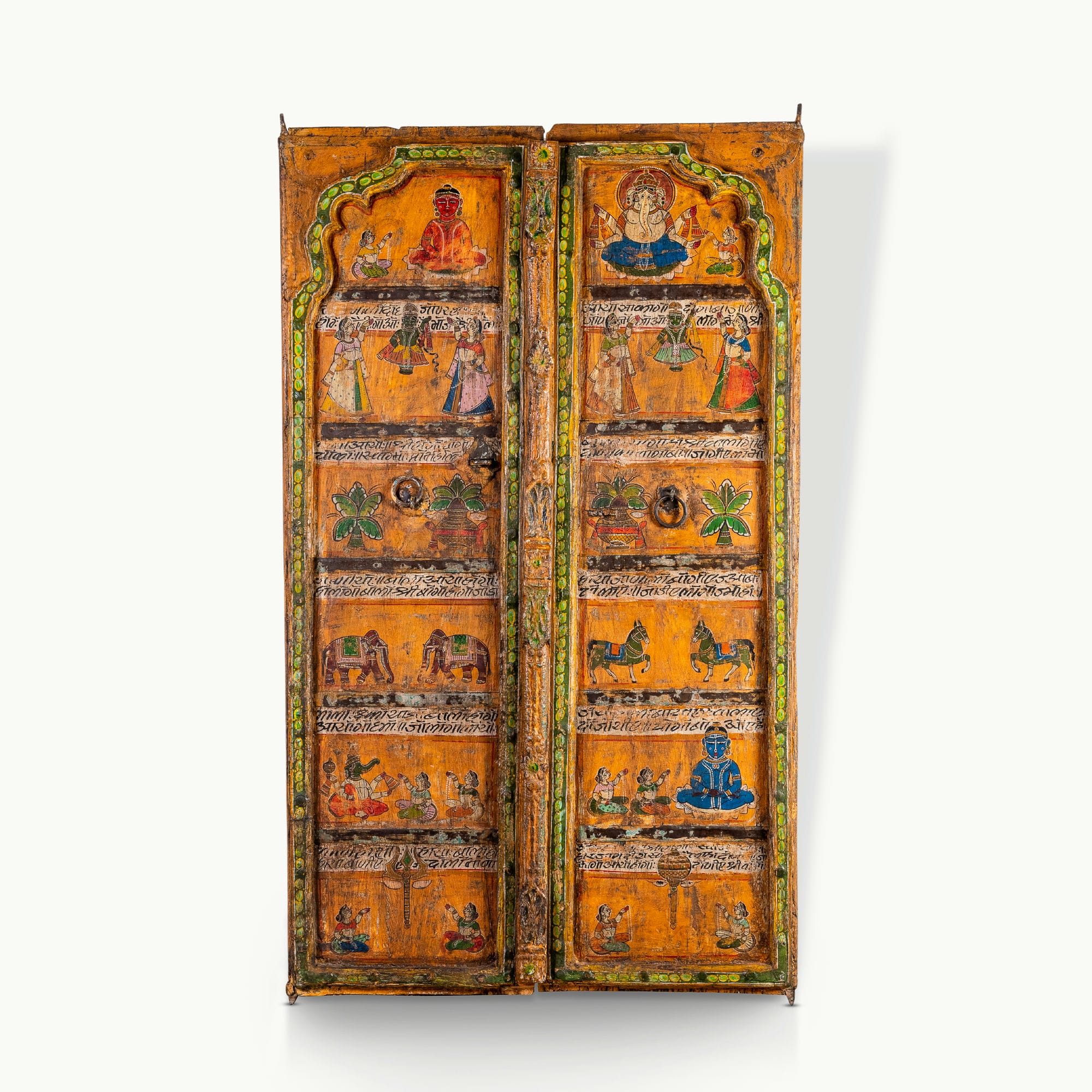 Painted mango wood doors featuring traditional deity murals and distressed iron hardware.