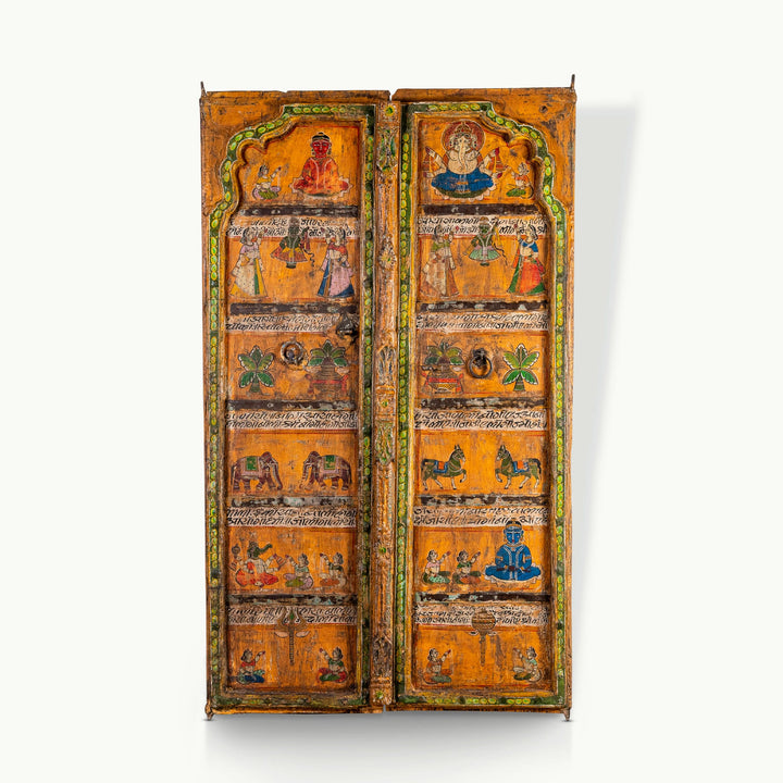 Painted mango wood doors featuring traditional deity murals and distressed iron hardware.