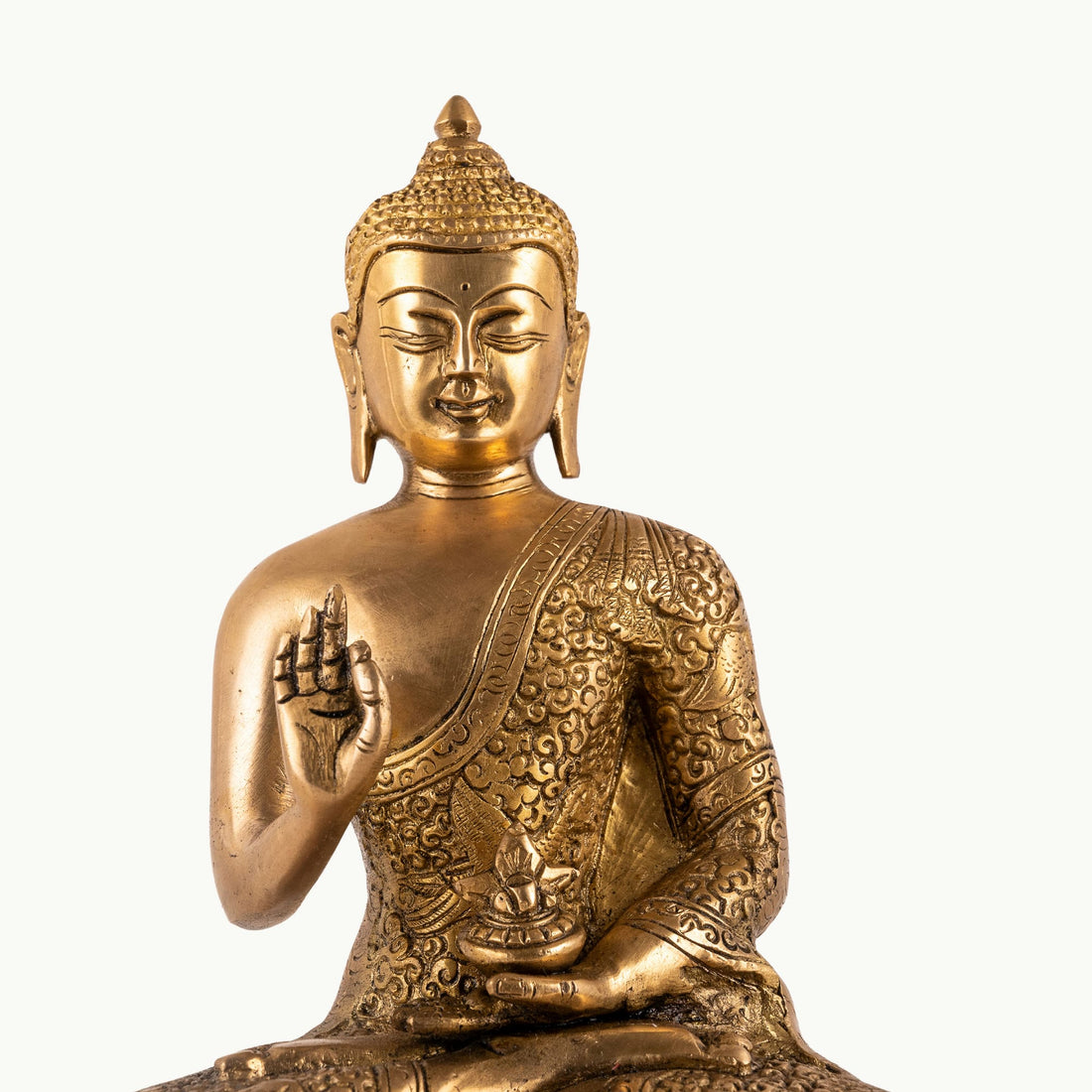 Antique polished brass buddha in abhaya mudra on tiered lotus base