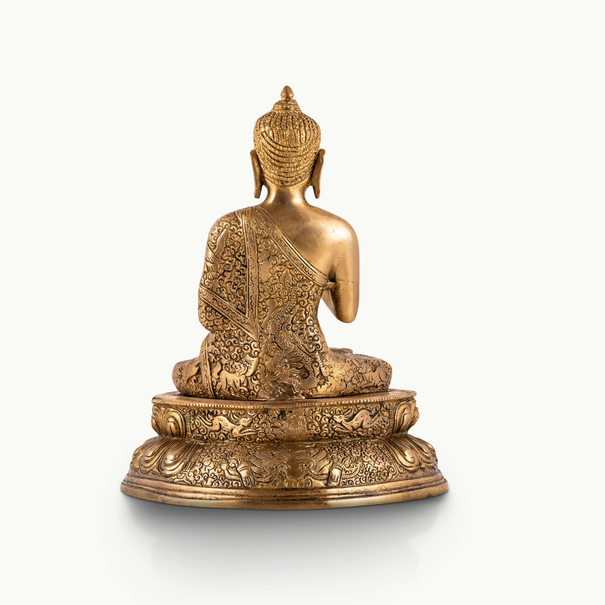 Antique polished brass buddha in abhaya mudra on tiered lotus base