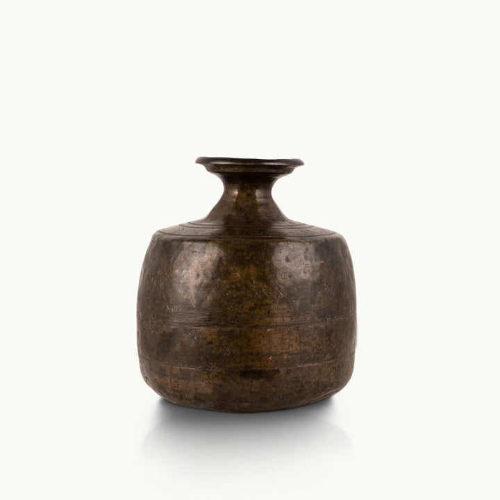 Antique Brass Decorative Vessel with a flared rim for a minimalist concrete console.