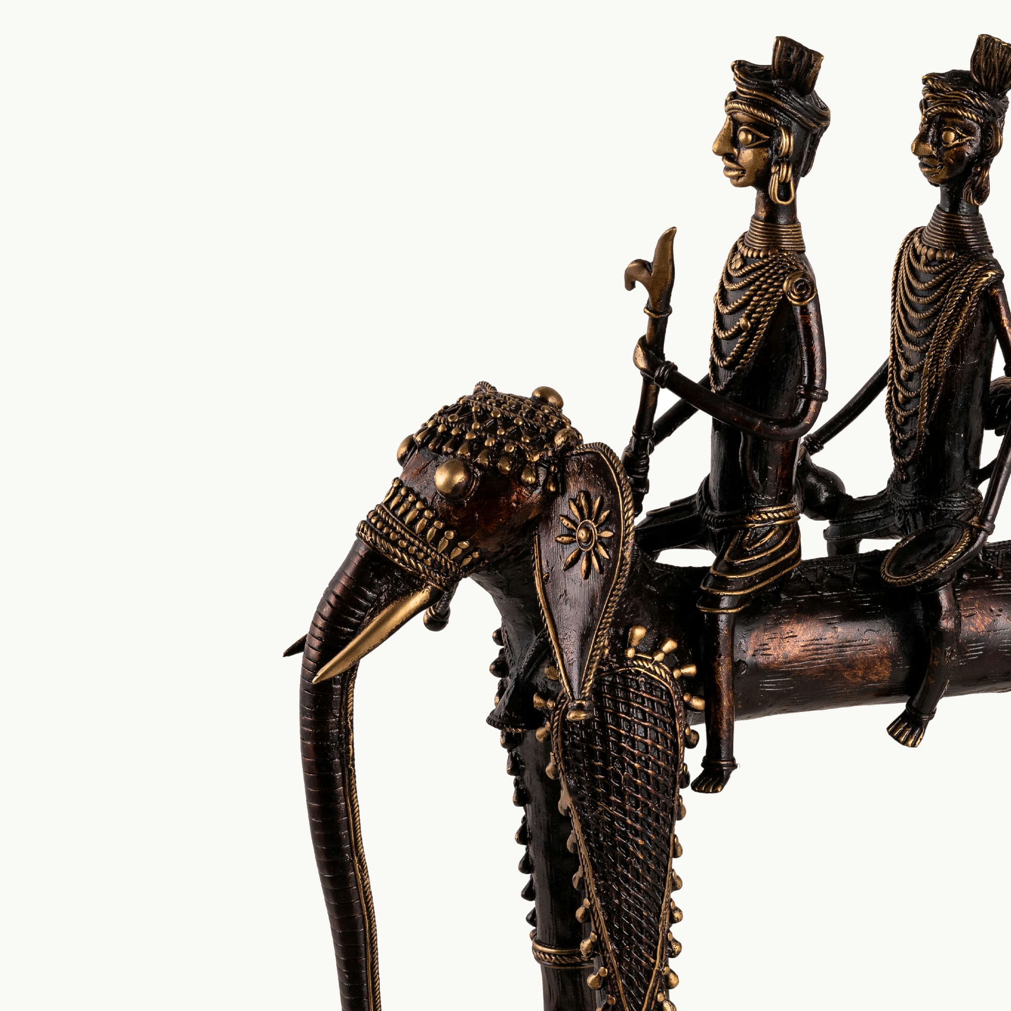 Dhokra Brass Processional Elephant Sculpture carrying three riders for a rustic wooden console