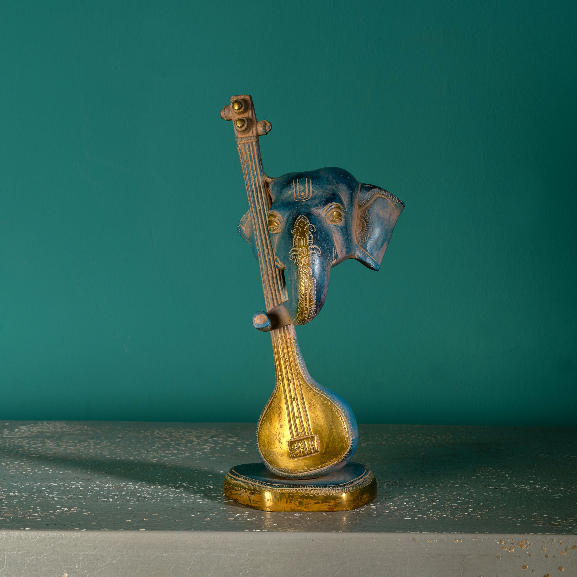 Painted Brass Musical Ganesha Sculpture: The Divine Melody