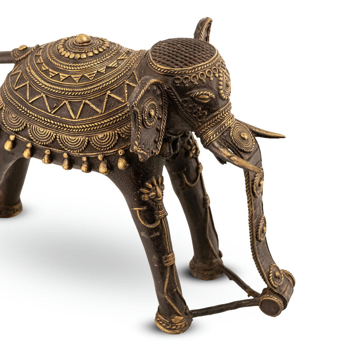Contemporary Indian metal animal figurine with a sweeping curled trunk 
