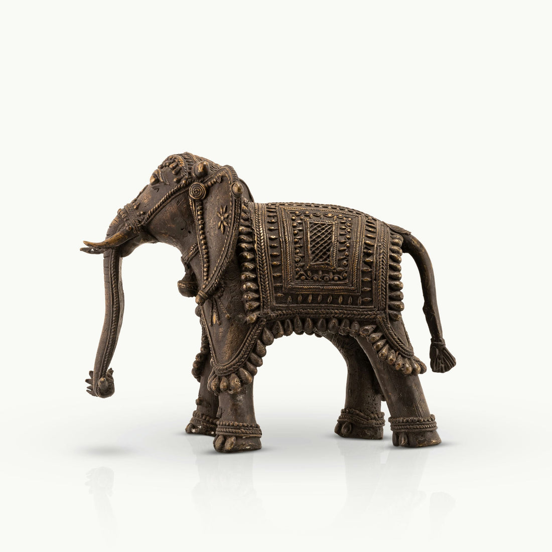 Indian ceremonial guardian decor showcasing intricate beadwork and dark patina for a solid mahogany desk or heritage office decor.