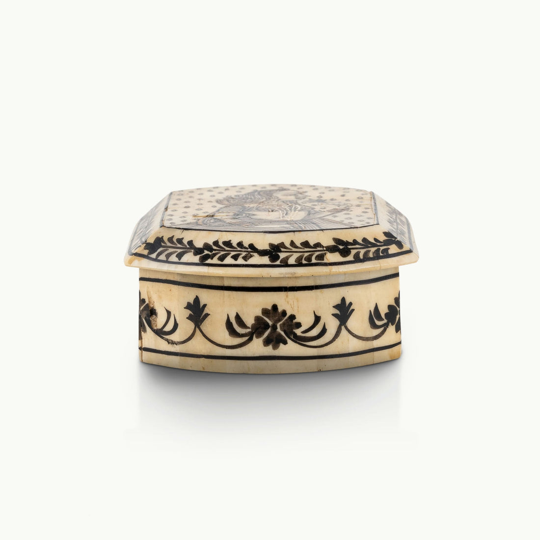 Portrait painted camel bone box featuring a Rajput noblewoman and black floral borders.