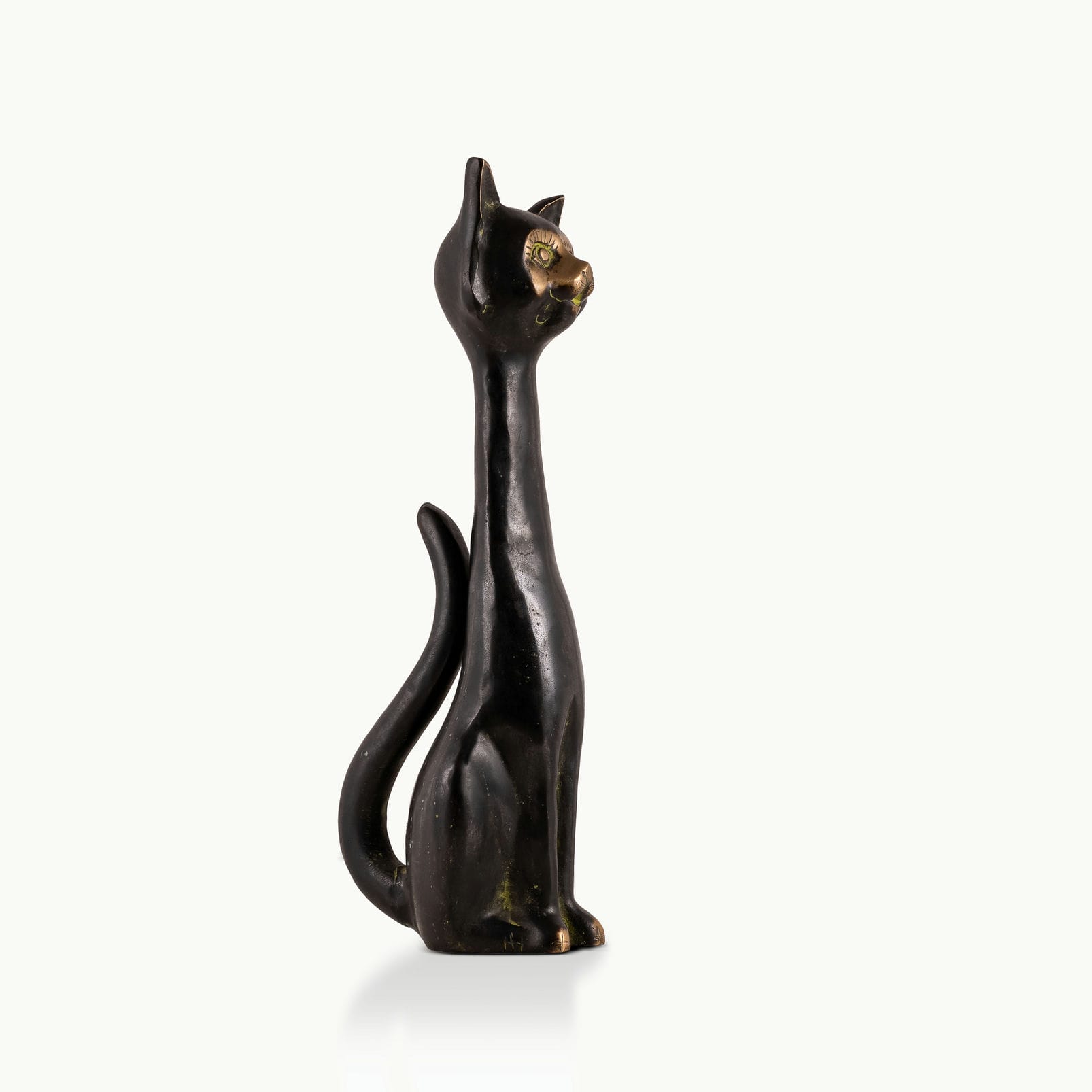Elongated Black Brass Cat Sculpture: The Midnight Observer