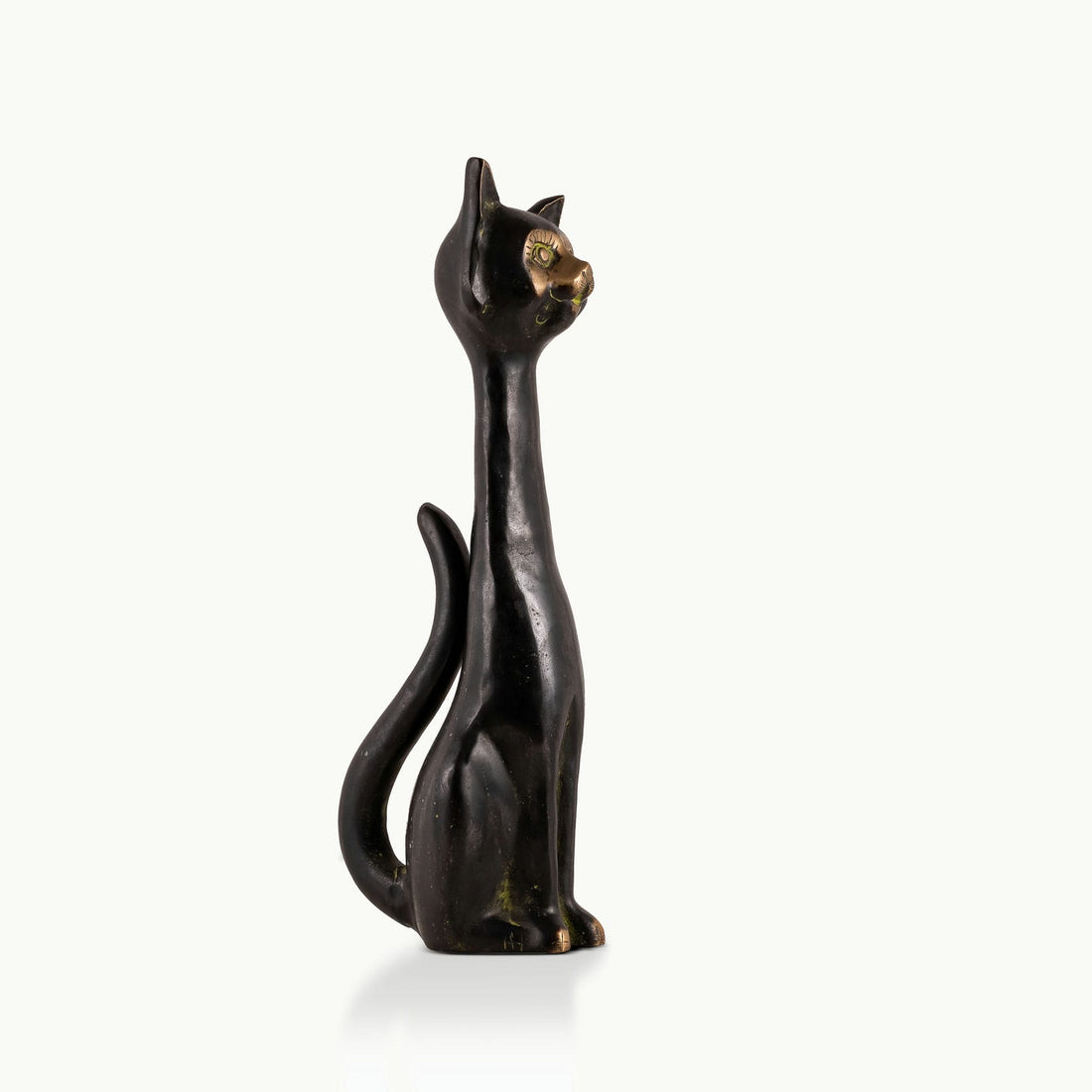 Elongated Black Brass Cat Sculpture: The Midnight Observer